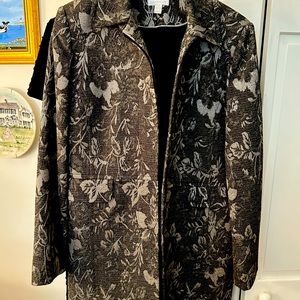 Pretty brocade silver and black sits below hip jacket- perfect with black slacks